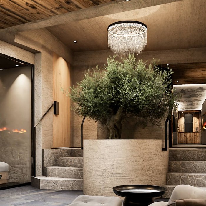 Modernes Spa mit grünen Pflanzenwänden und gemütlichen Sesseln