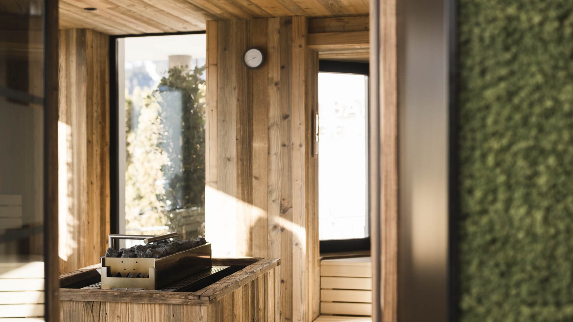 Interior of a wooden sauna with benches and a heater